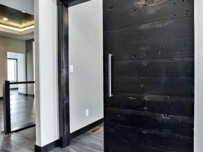 Solid Modern Dark Wood Ebony Reclaimed Wood Sliding Door with Brush Metal Hardware